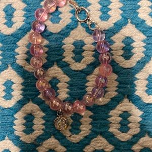 Pink clear bracelet with charm